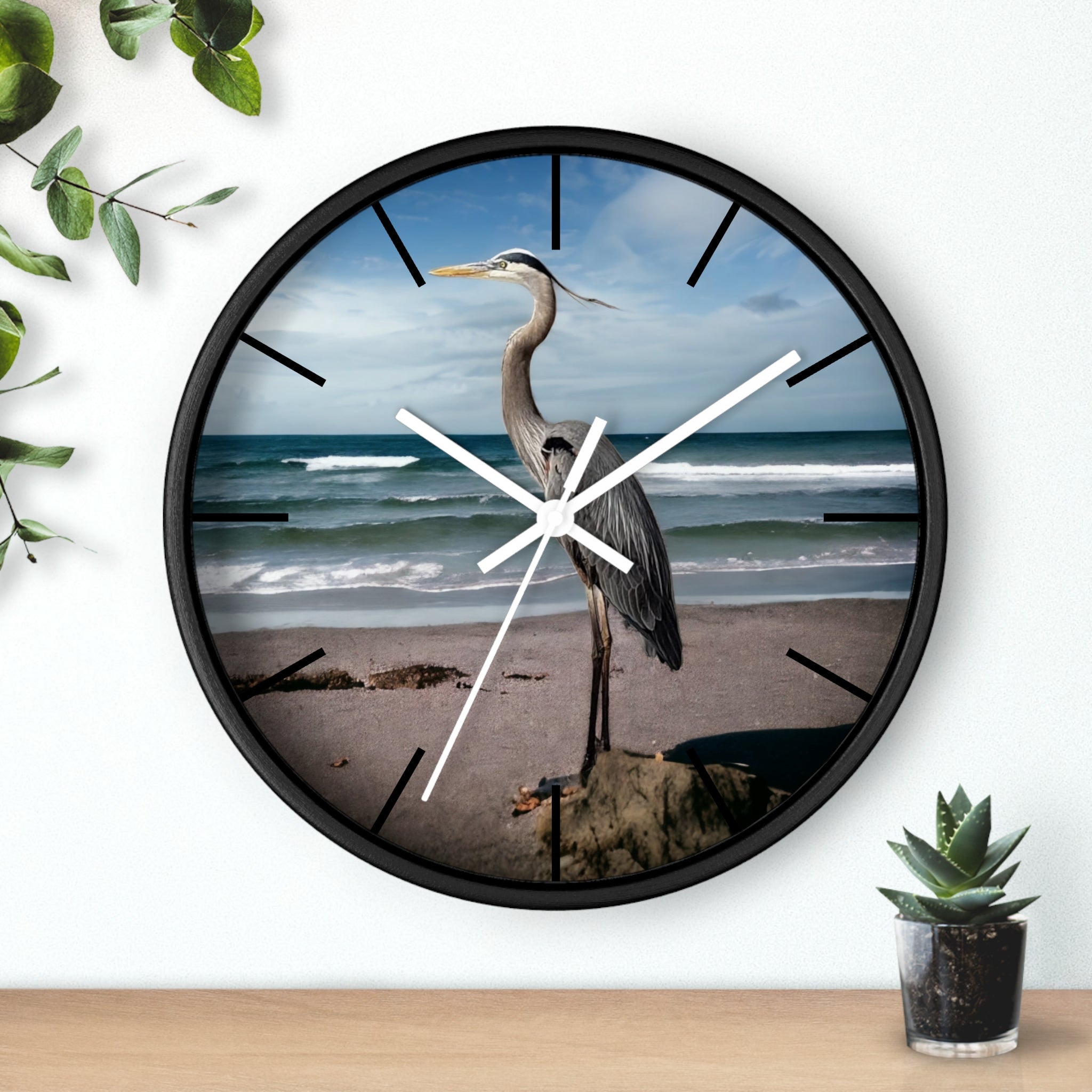 A detailed view of the wooden frame on the heron wall clock, highlighting the use of handmade resin on wood.