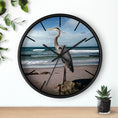 Load image into Gallery viewer, A stunning wall clock featuring a beautiful heron, made with handmade resin on wood, set against a calming ocean backdrop.
