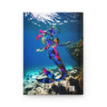 Load image into Gallery viewer, Gorgeous hardcover journal featuring a stunning ocean-themed design with a handmade resin mermaid on wood, showcasing vibrant blue and pink colors.