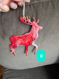 Charger l'image dans la visionneuse de la galerie, Artistic handmade resin on wood reindeer ornament, displaying one-of-a-kind colors and back painted for a polished finish.
