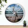 Load image into Gallery viewer, Artistic shot of the ocean backdrop wall clock showing a heron in flight, crafted with handmade resin on wood for a personalized decor vibe.