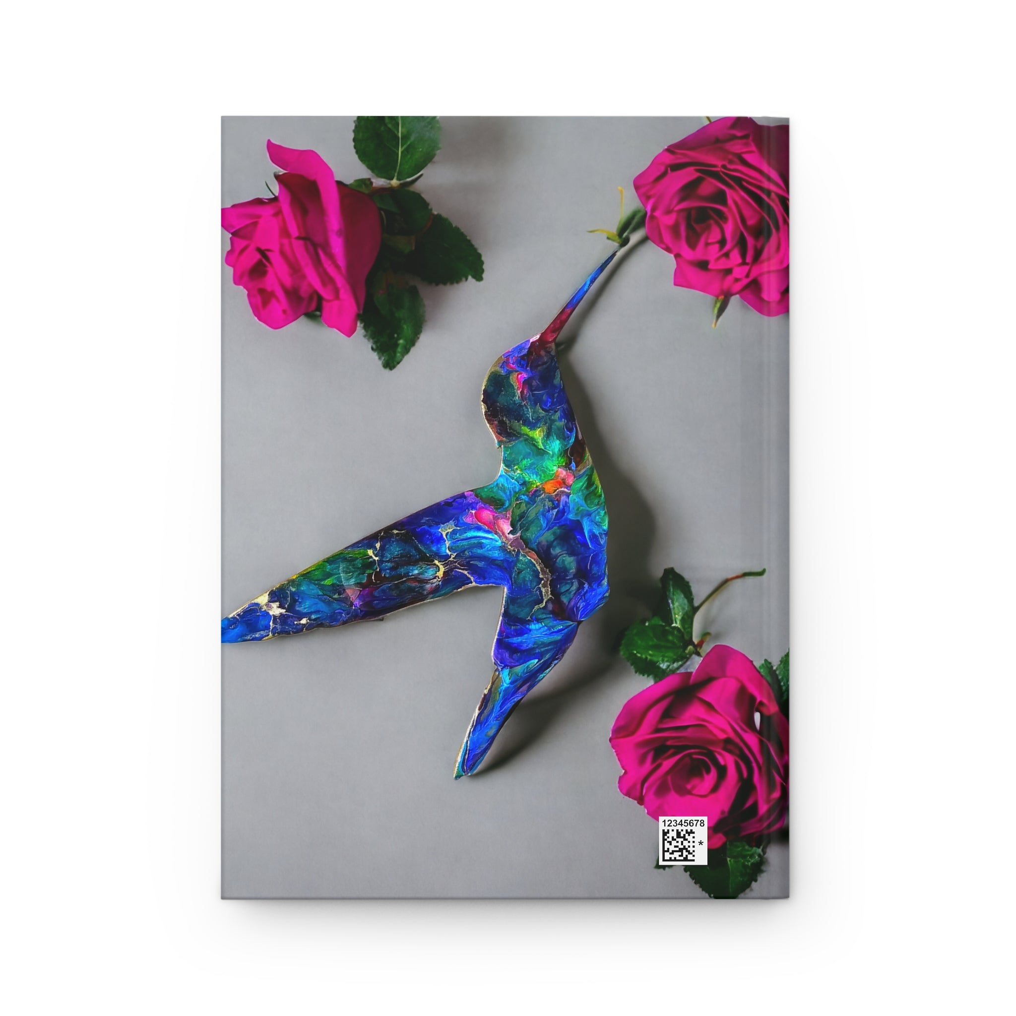 Close-up of the matte finish journal cover showing the vibrant blue hummingbird, a unique handmade resin on wood design with pink roses.