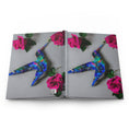 Load image into Gallery viewer, A side perspective of the hardcover journal, illustrating the full wraparound print of a blue hummingbird, a stunning handmade resin on wood art piece paired with pink roses.