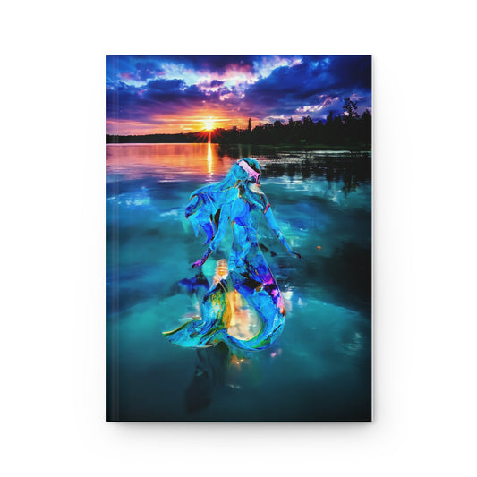 Artistic view of a hardcover journal featuring a handmade resin on wood mermaid abstract, showcasing stunning colors of a sunset over the water.