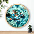 Load image into Gallery viewer, A side view of the coastal-themed wall clock displaying its round shape and a beautifully crafted sea turtle in handmade resin on wood, designed for a serene ambiance.
