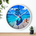 Load image into Gallery viewer, A round wall clock featuring beautiful artwork of a handmade resin mermaid on wood, set against a tropical beach and adorned with a starfish.