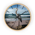 Load image into Gallery viewer, A stunning wall clock featuring a beautiful heron against an ocean backdrop, showcasing handmade resin on wood for a unique coastal decor accent.