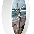 Load image into Gallery viewer, The large heron design on the wall clock with a tropical beach background, enriched by the craftsmanship of handmade resin on wood.