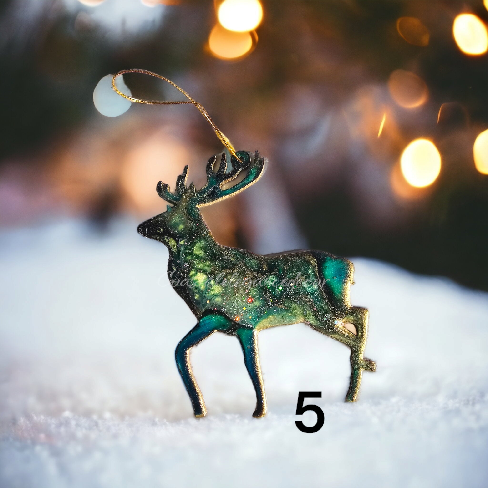 Customizable handmade resin on wood reindeer ornament, demonstrating the fluid art technique and available in various colors.