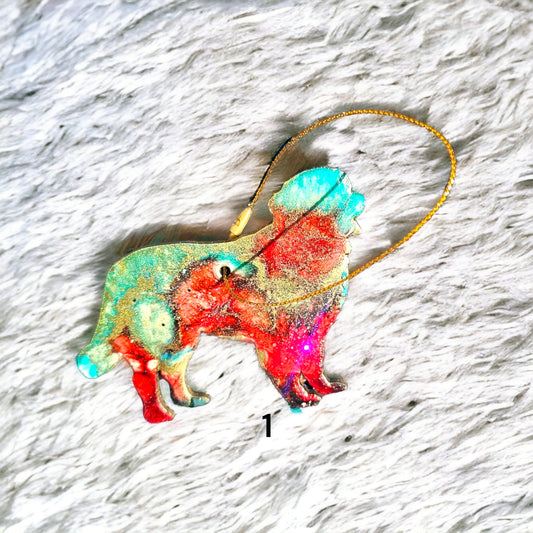 Colorful handmade resin Bernese Mountain Dog Christmas ornament in red and turquoise, showcasing a glittery finish, ideal for holiday ornament collections.