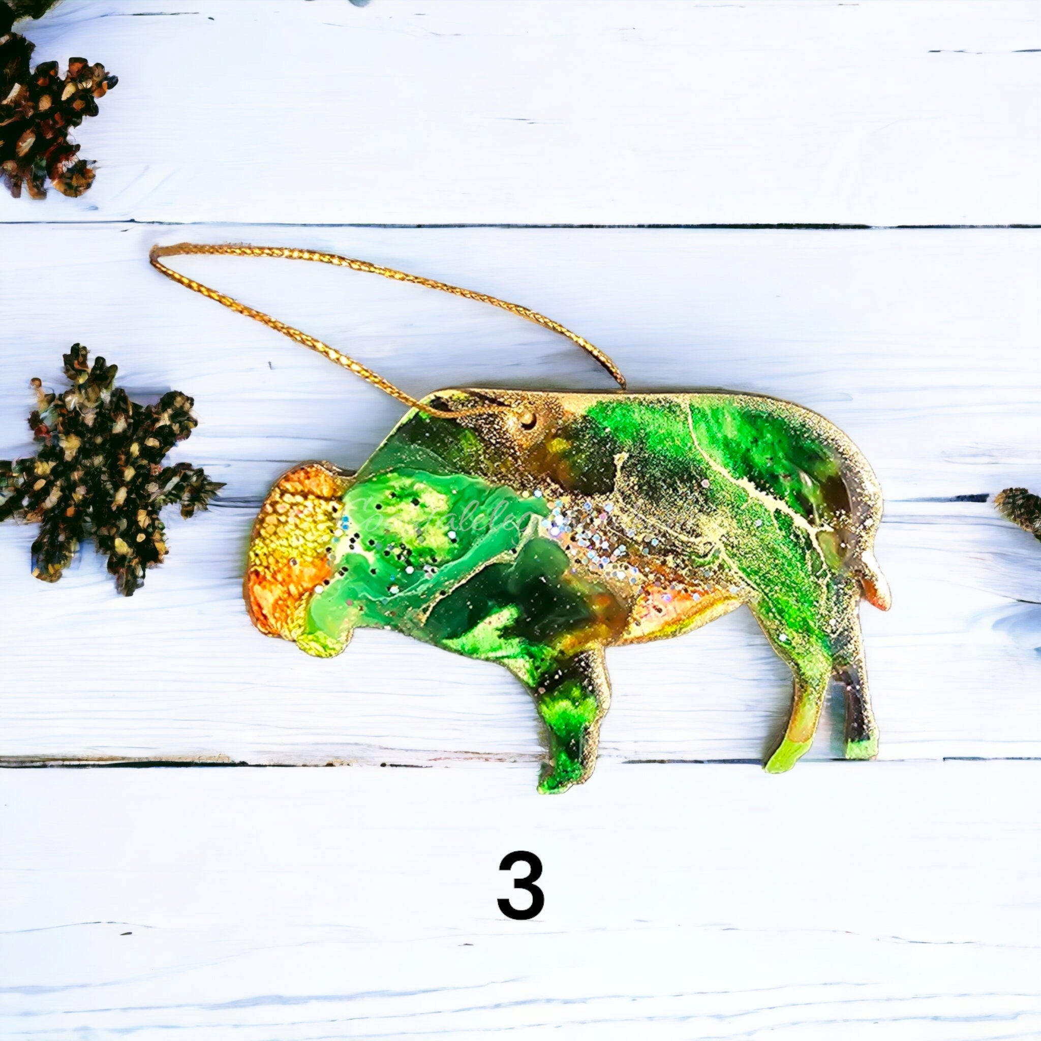 Colorful buffalo bison ornament featuring handmade resin on wood, designed for hunters and nature lovers alike.
