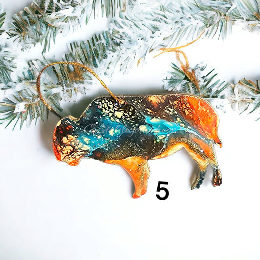 Handmade resin on wood buffalo bison ornament perfect for nature lovers, showcasing vibrant colors and a unique wildlife design.
