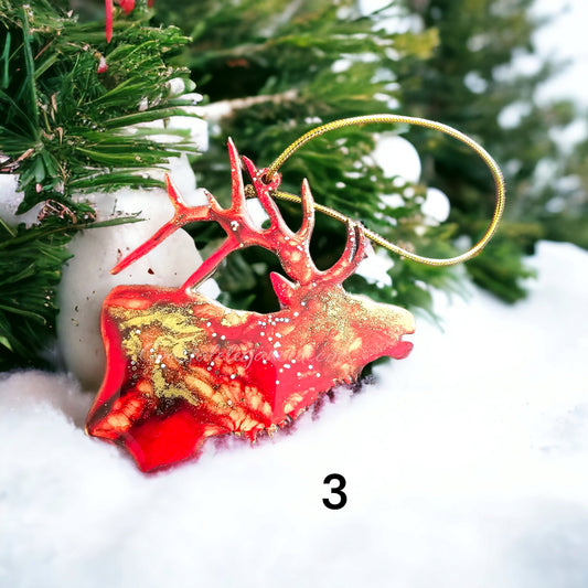 A beautifully crafted handmade resin on wood ornament featuring a bull elk design, perfect for nature enthusiasts.