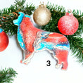 Charger l'image dans la visionneuse de la galerie, Handmade resin on wood Australian Shepherd ornament with striking red and blue patterns, designed to add a colorful touch to your holiday tree.