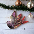 Charger l'image dans la visionneuse de la galerie, Unique peace dove Christmas ornament made from lightweight wood and vivid resin, showcasing handmade craftsmanship and colorful details.
