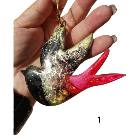 Handmade resin on wood Christmas ornament showcasing a unique hummingbird design, adding a touch of sparkle to your holiday decor.
