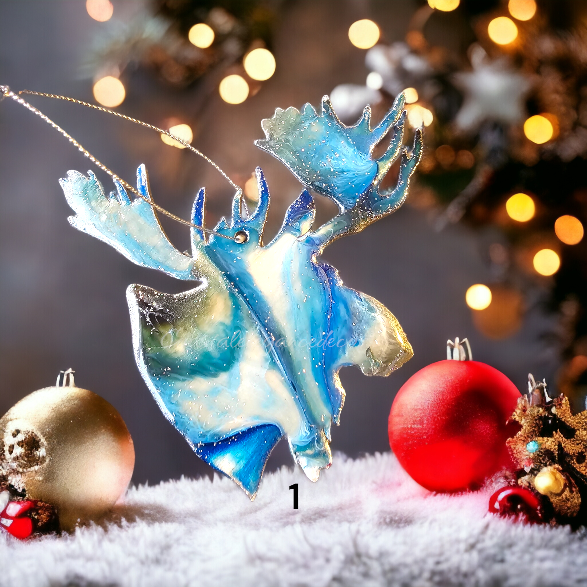 Beautiful moose head ornament handcrafted with handmade resin on wood, showcasing intricate details and vibrant colors, perfect for nature lovers.