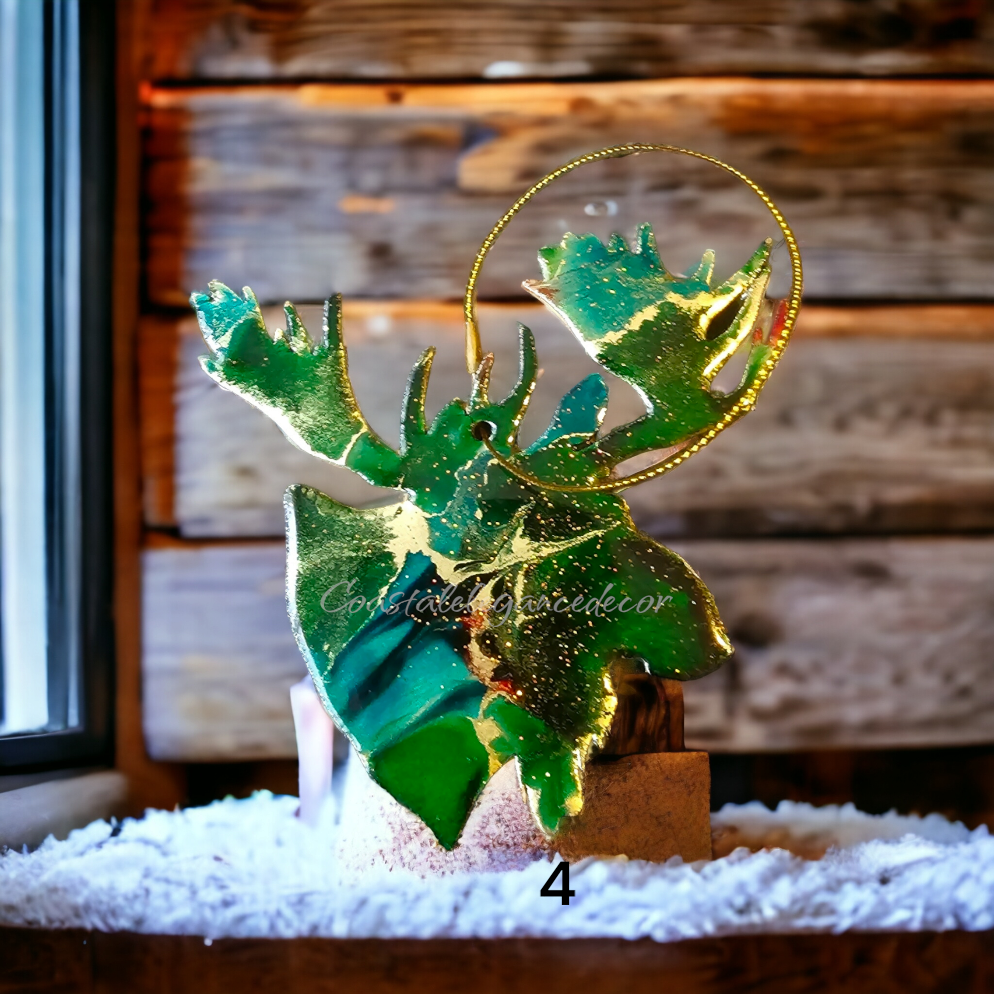 Artistic moose head ornament crafted with handmade resin on wood, presenting a stunning blend of natural elements and colorful resin finishes.