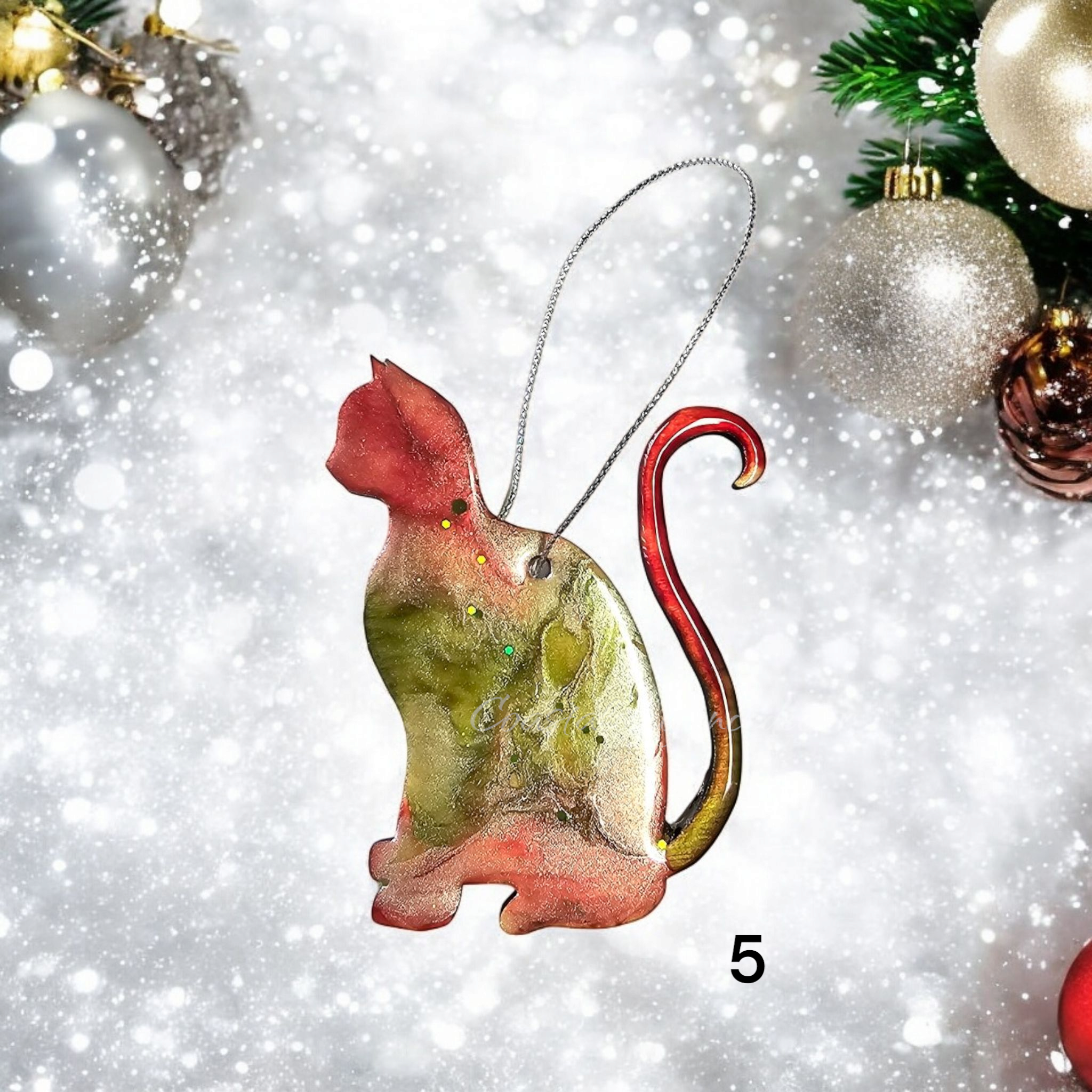 Colorful kitty cat Christmas ornament made from handmade resin on wood, featuring vibrant hues and sparkly accents, perfect for holiday decor.