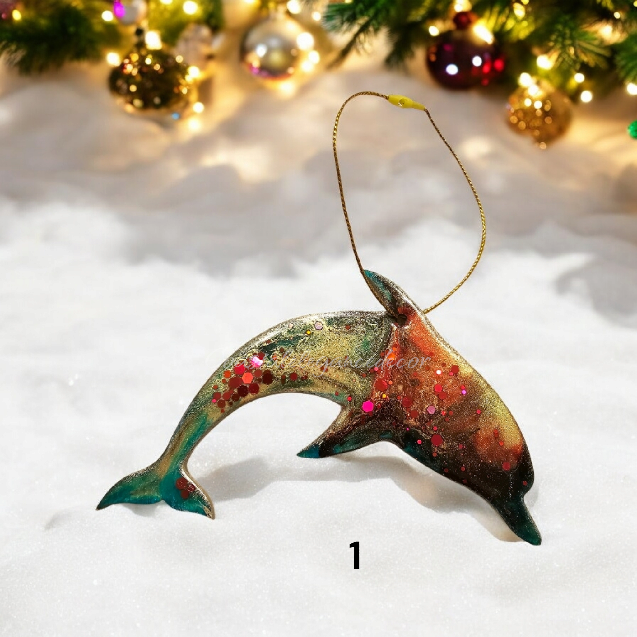 Colorful dolphin ornament featuring handmade resin on wood, perfect for a beachy Christmas tree.