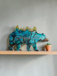 Load image into Gallery viewer, Shimmery silver and teal handmade resin bear with tree cutouts.