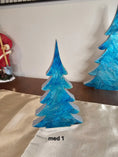 Load image into Gallery viewer, Charming 12-inch Shimmery Silver Blue Evergreen Wood Christmas Trees Holiday Mantelpiece featuring a unique design with silver shimmer glaze, ideal for holiday tabletop decoration.