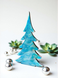 Load image into Gallery viewer, Shimmery Silver Blue Evergreen Wood Christmas Trees Holiday Mantelpiece in 8 inches, a charming piece for your mantel or shelf.