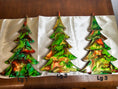 Load image into Gallery viewer, Charming Handmade Green and Red Resin Christmas Trees with Branches Holiday Mantelpiece - Medium 8" size on display.