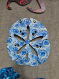 Load image into Gallery viewer, Large sand dollar indigo nautilus pattern - weatherproof coastal acrylic wall art shown with standoffs