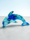 Load image into Gallery viewer, Shimmery silver and cobalt blue with teal highlighted 15" dolphin handmade resin all decoration.