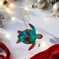 Charger l'image dans la visionneuse de la galerie, Vibrant handmade resin on wood sea turtle ornament showcasing sparkly details that enhance festive decorations.