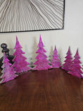 Load image into Gallery viewer, Hot Pink Silver Evergreen Christmas Trees Mantel Sitter Holiday Tabletop Decoration showcasing the 12 inch size.