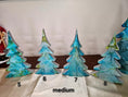 Load image into Gallery viewer, Beautifully crafted Handmade Blue Green Silver Resin Christmas Trees, perfect for mantelpiece or holiday displays, showcasing distinct patterns and sizes.