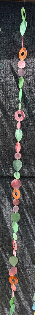 Charger l'image dans la visionneuse de la galerie, Capiz Shell Strands in Pinks and Greens 72 Inches Bougainvillea showcasing a colorful arrangement of shell shapes including teardrops, circles, and cutouts, ideal for decorative wind chimes or doorway strands.