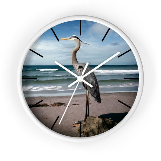 Beautiful wall clock featuring a heron against an ocean backdrop, showcasing handmade resin on wood for a unique decorative touch.