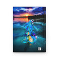 Load image into Gallery viewer, Beautiful matte hardcover journal with a unique handmade resin on wood mermaid design, blending harmoniously into a tranquil lake at dusk.
