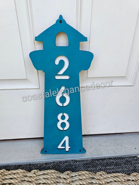 Stylish beach cottage name sign with precision laser cut details, incorporating handmade resin on wood for a vibrant and personalized look.