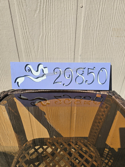 Customizable name sign crafted from handmade resin on wood, showcasing a whimsical design ideal for beach-themed decor with vibrant colors.