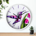 Load image into Gallery viewer, Close-up view of the hummingbird wall clock showcasing the intricate details of the handmade resin on wood design, ideal for nature lovers.
