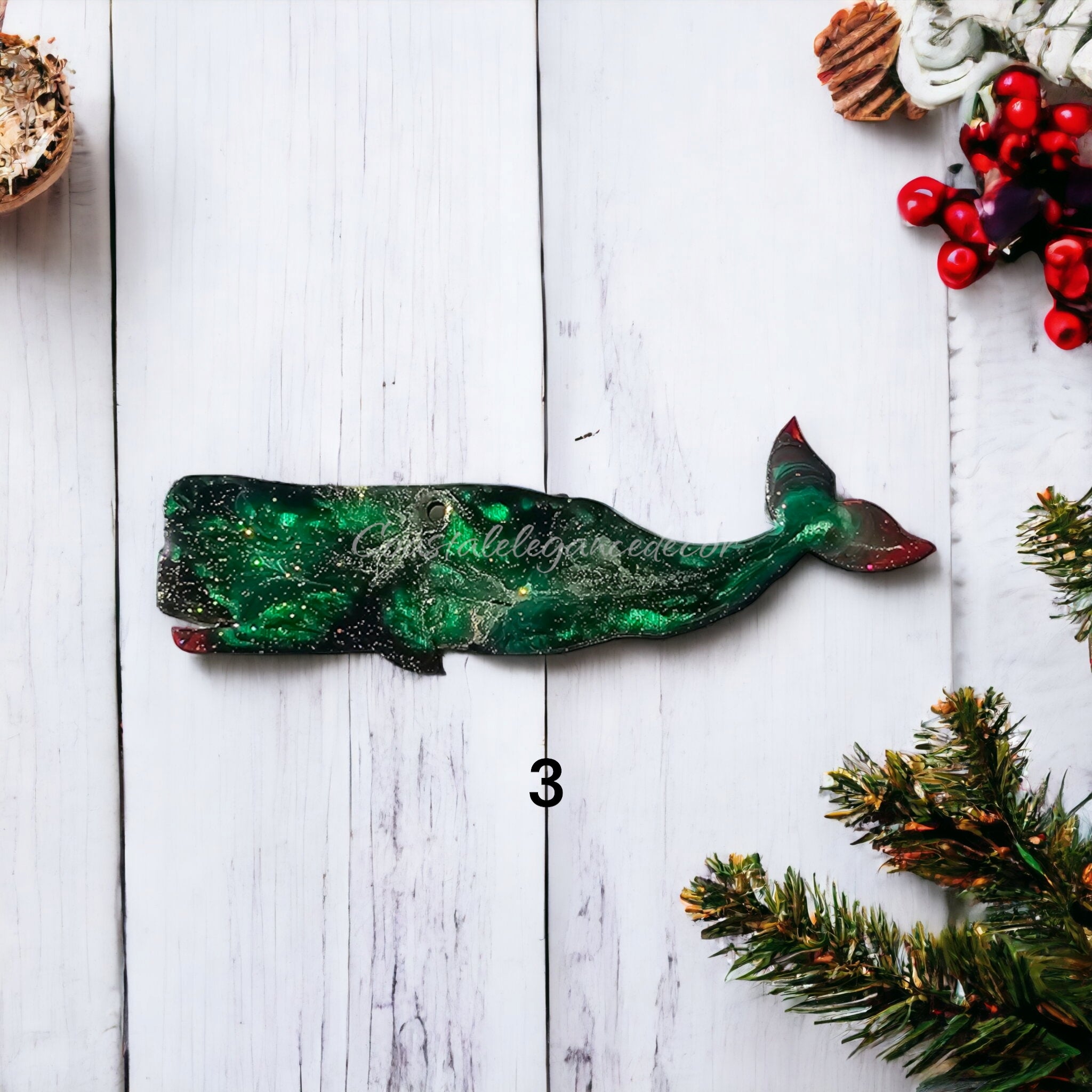 Charming handcrafted Ocean Sperm Whale Christmas Ornament - Colorful Resin & Wood Decor, 5" x 2" adds a whimsical touch to coastal holiday celebrations.