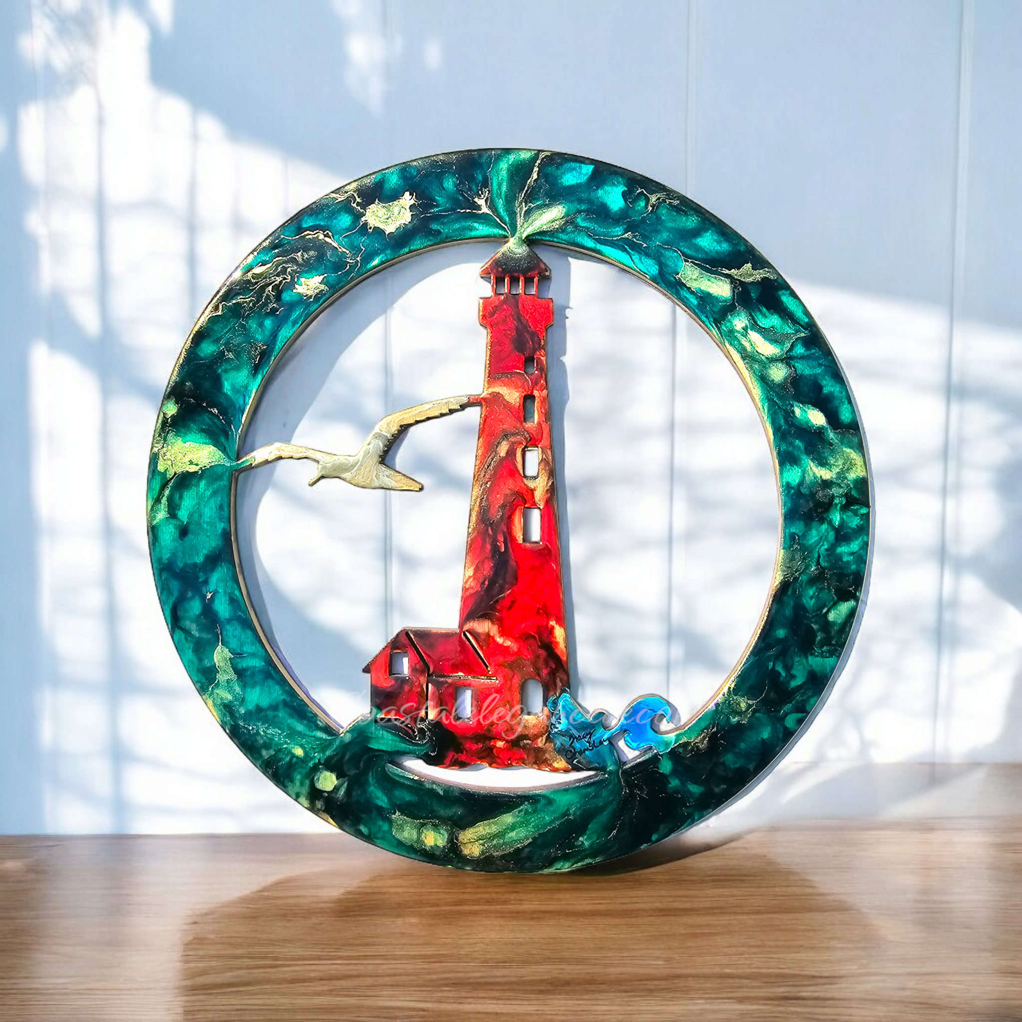Stunning display of the coastal lighthouse themed wall plaque, crafted with handmade resin on wood for a unique coastal ambiance.