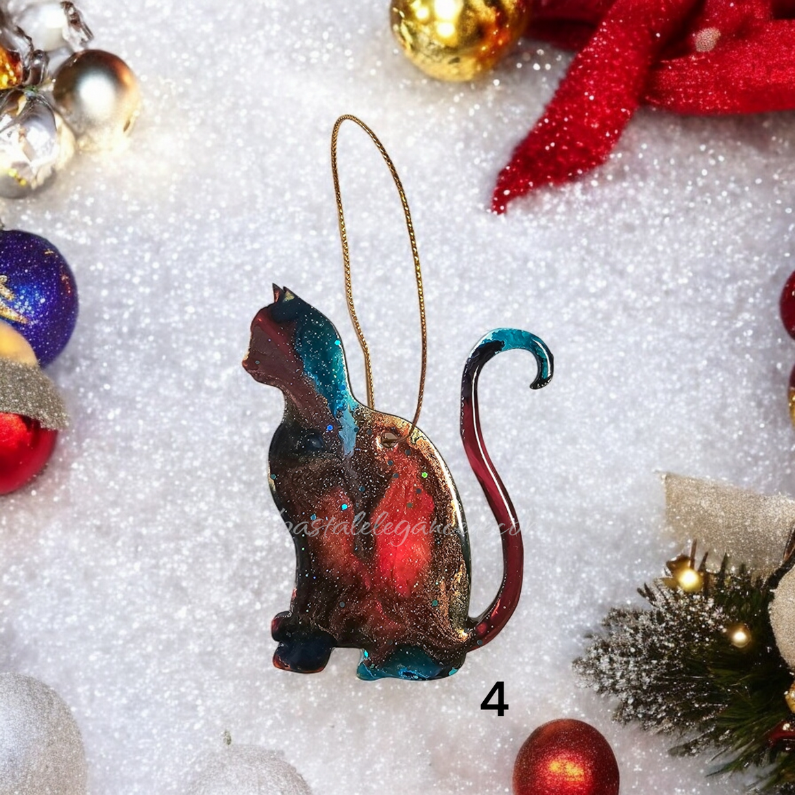 Handmade resin on wood colorful kitty cat Christmas ornament featuring a sparkly design with a silver cord for hanging.