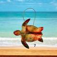 Charger l'image dans la visionneuse de la galerie, Beautifully crafted sea turtle ornament made of handmade resin on wood, featuring a glittered back for a festive touch.
