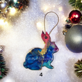 Load image into Gallery viewer, Cheerful Handmade Christmas Ornaments, showcasing vibrant rabbits with gold and silver accents by Coastal Elegance Decor.
