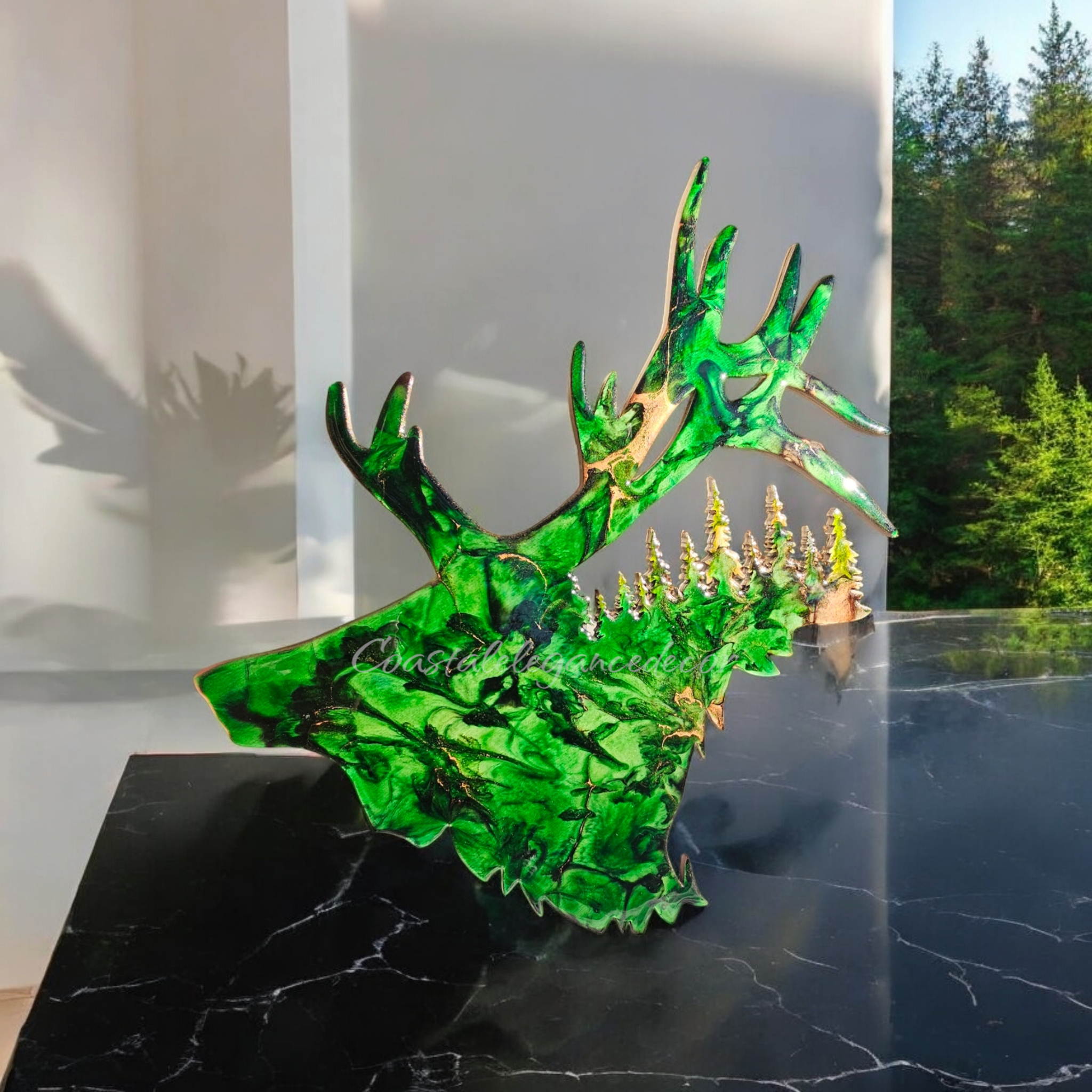 Multi-colored handmade resin on wood elk design, featuring intricate tree cutouts for a unique home accent.