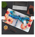 Load image into Gallery viewer, Beautiful Print Sublimation Handcrafted Dragonfly with Peach Flowers Desk Mat showcasing a colorful blue dragonfly design against vibrant peach flowers. Ideal for enhancing workspaces, this customizable desk mat comes in two sizes, featuring a durable neoprene material with anti-slip backing.
