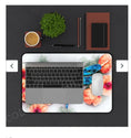 Load image into Gallery viewer, Beautiful Print Sublimation Handcrafted Dragonfly with Peach Flowers Desk Mat, showcasing a laptop and coffee cup on the colorful desk mat with vibrant design.
