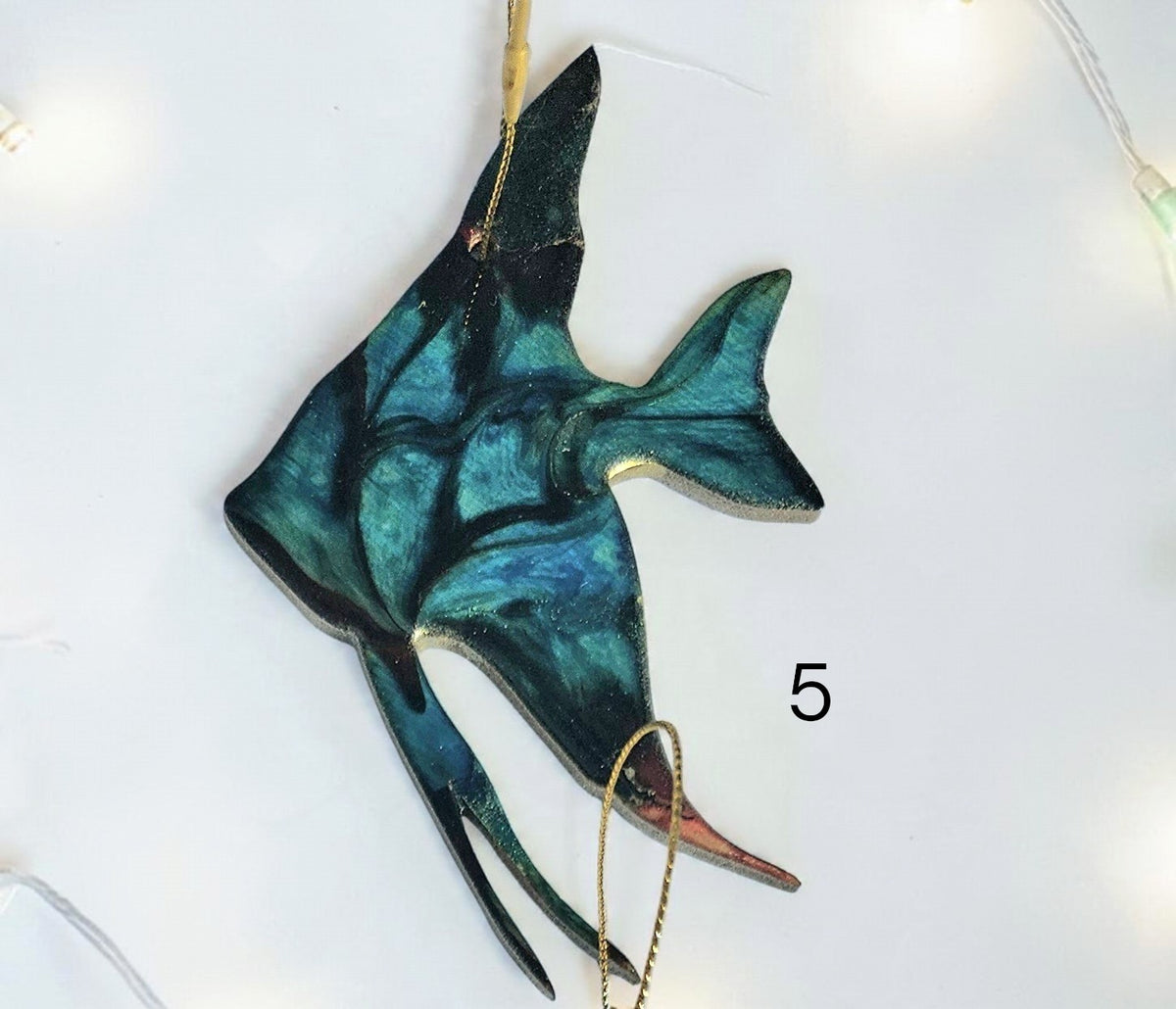 Coastal Elegance Decor handmade tropical angel fish ornament in shimmering blue and black resin on wood with gold trim