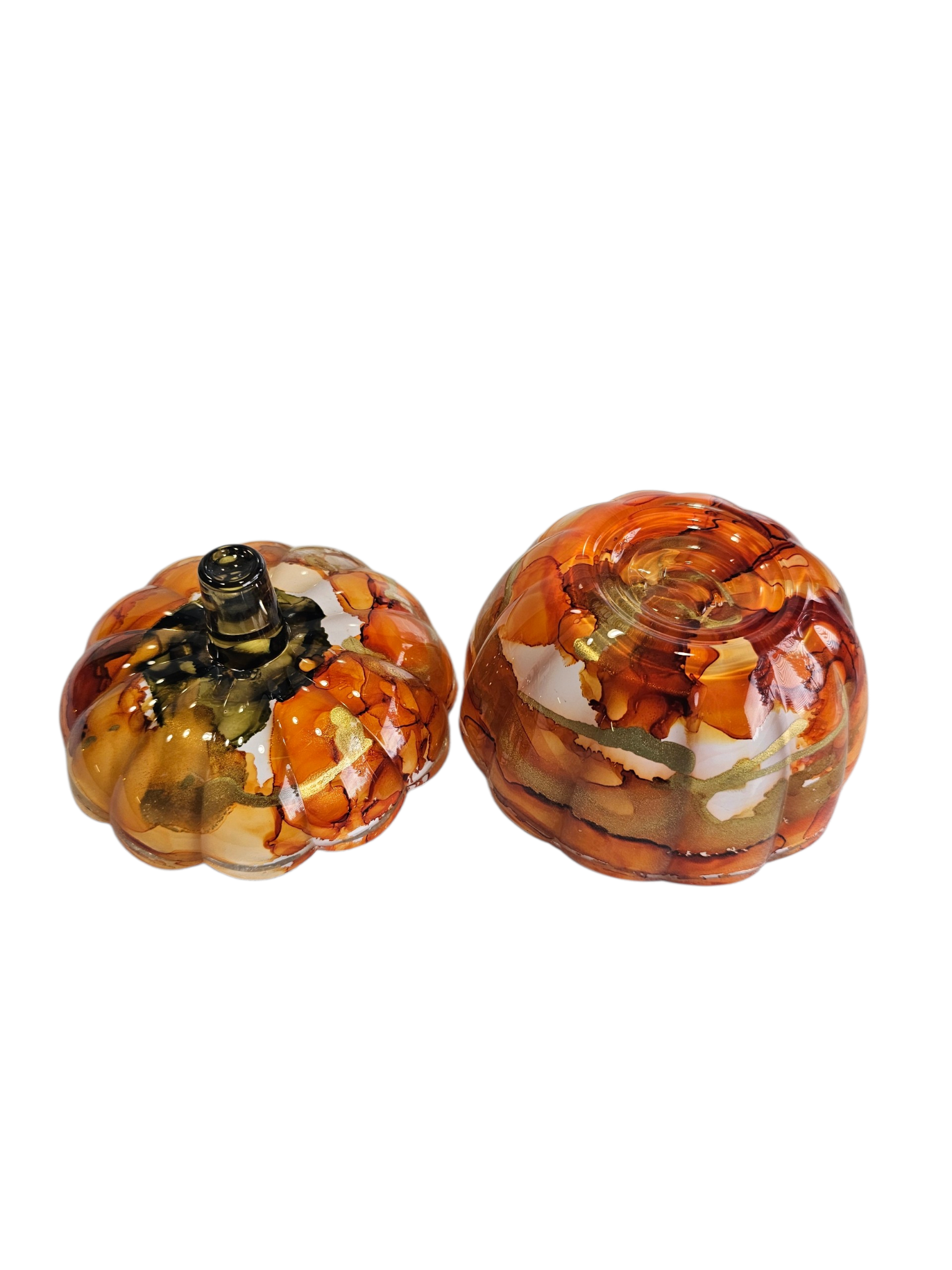 Coastal Elegance Decor handcrafted glass pumpkin dish with amber and orange ink swirls and a removable lid.