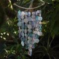 Load image into Gallery viewer, Capiz Shell Inverted Arch Wind Chimes Decor Lavender featuring a beautiful array of lavender and teal capiz shells, gently tinkling in the light, perfect for adding a soothing ambiance to any outdoor space.
